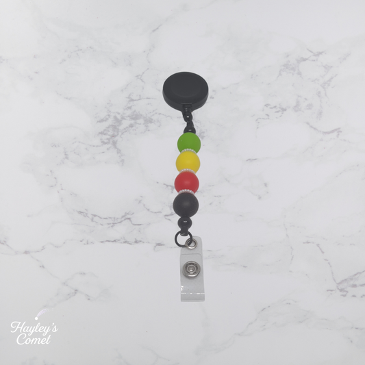 Orbit Arcade Badge Reel